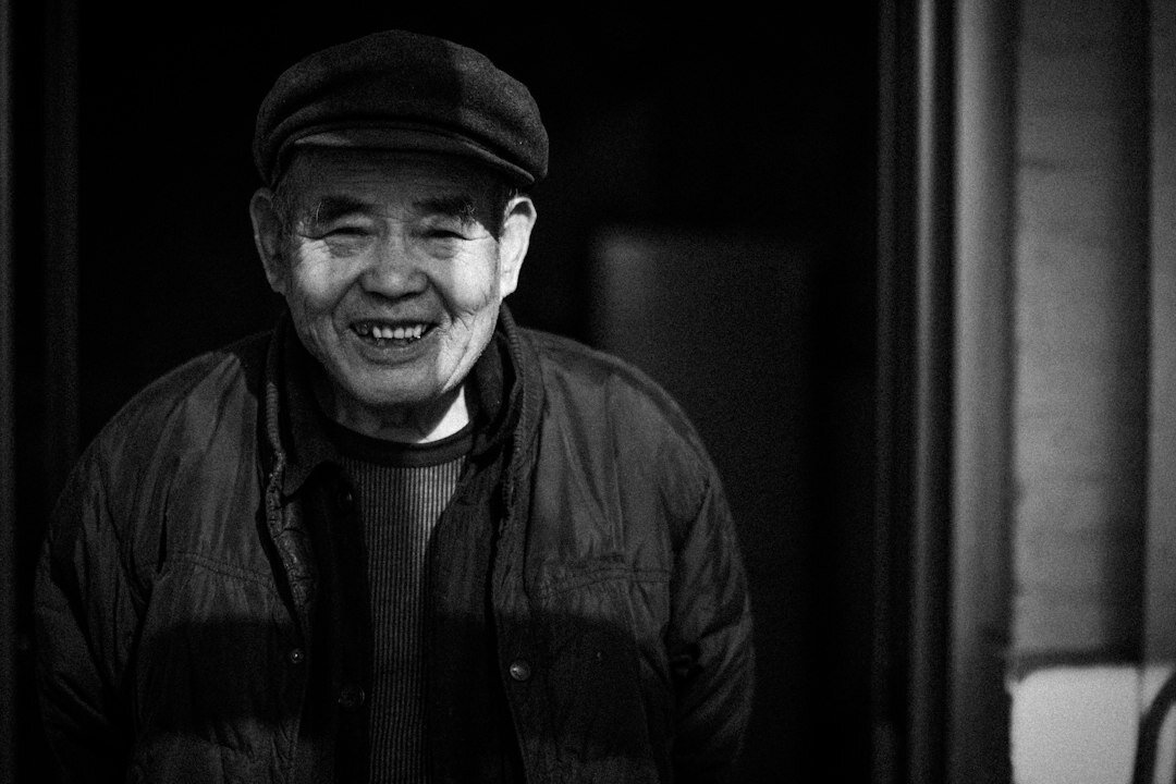 Portrait of a Japanese man in his 30s smiling
