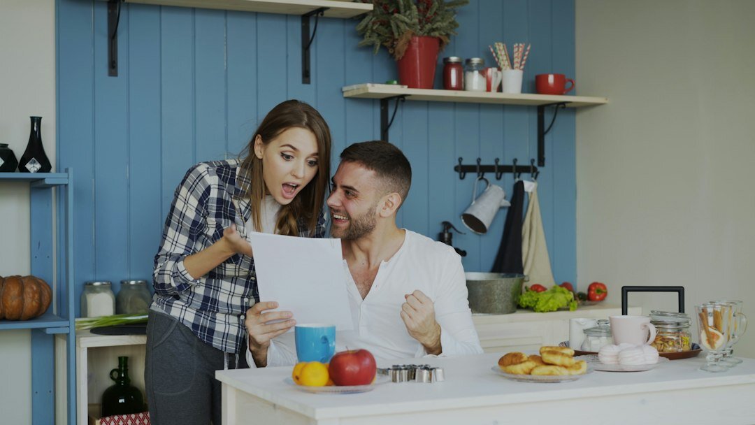 happy couple managing finances