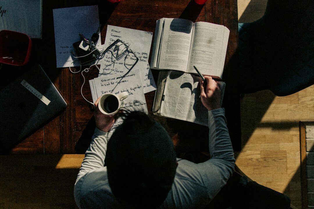 person studying investment charts